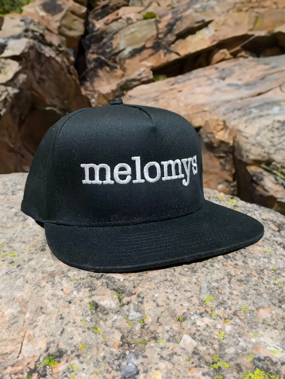 Melomys Embroidered Flat Bill Cap