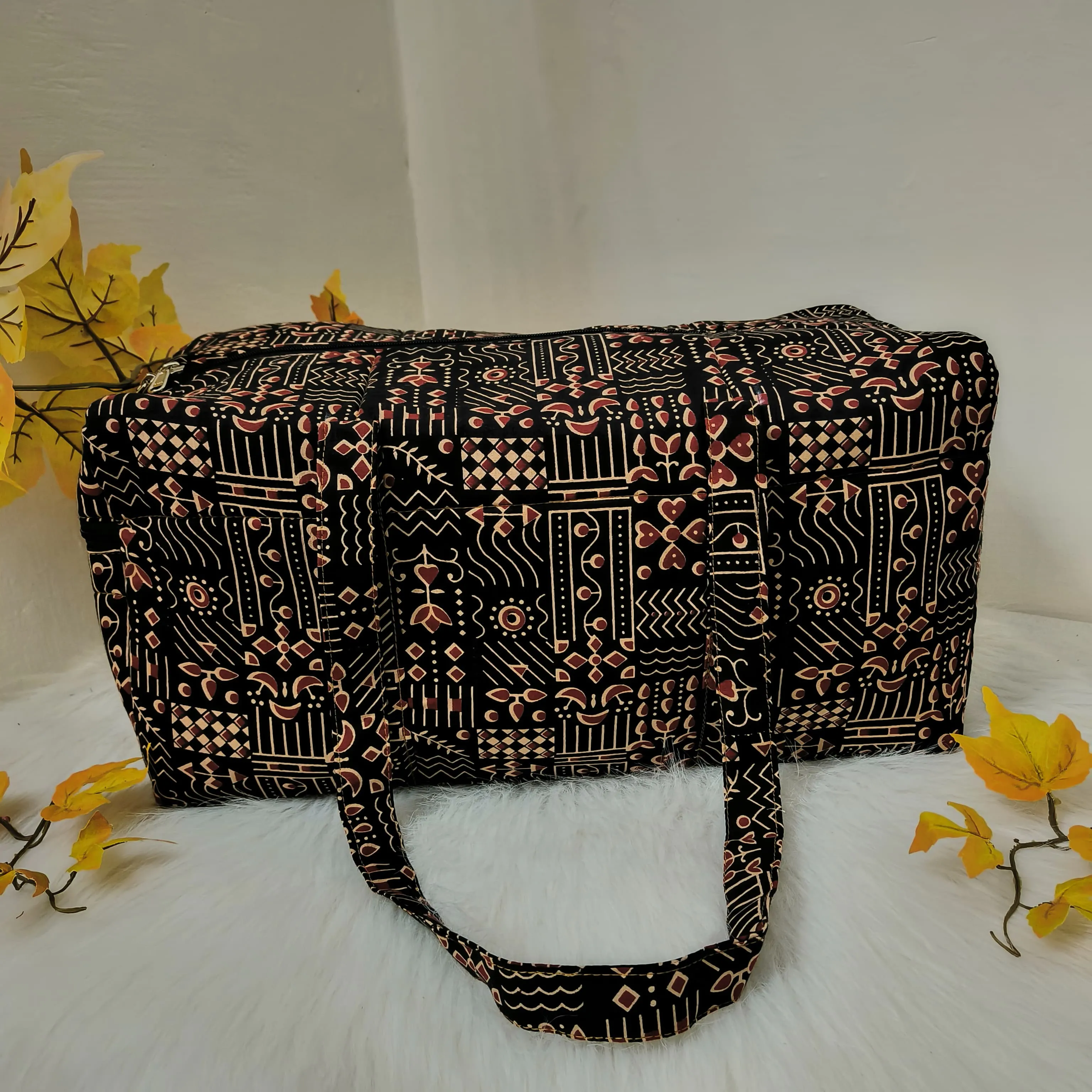 Rectangle Travel Bag Brown with Red Graphic Design.