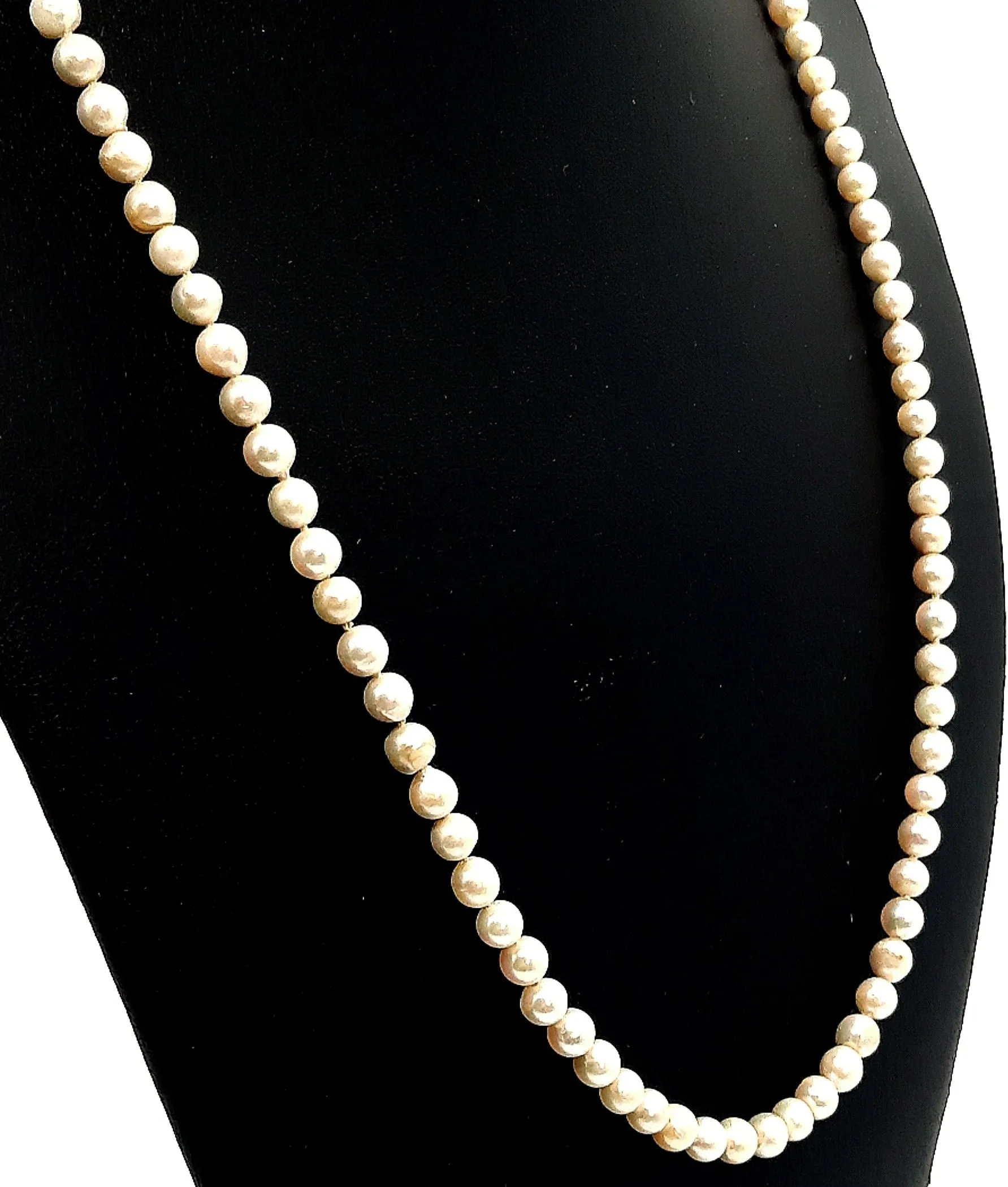 Strand of 99 Cultured Pearls with a Yellow Gold Albert Swivel Clasp