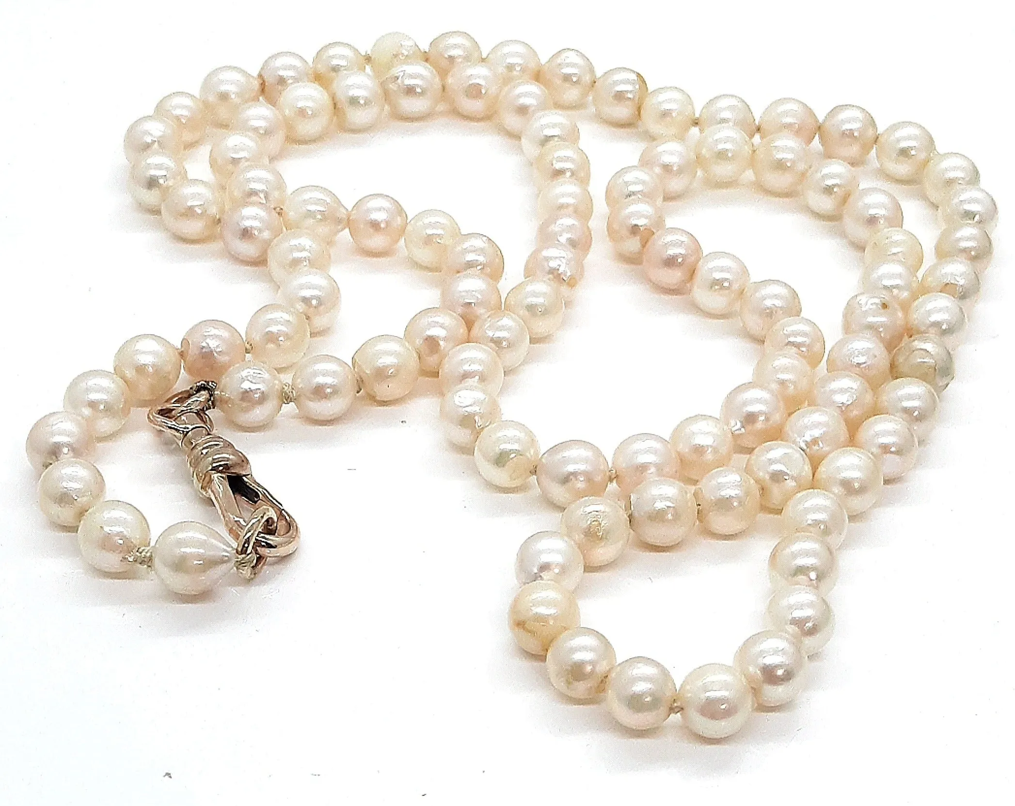 Strand of 99 Cultured Pearls with a Yellow Gold Albert Swivel Clasp