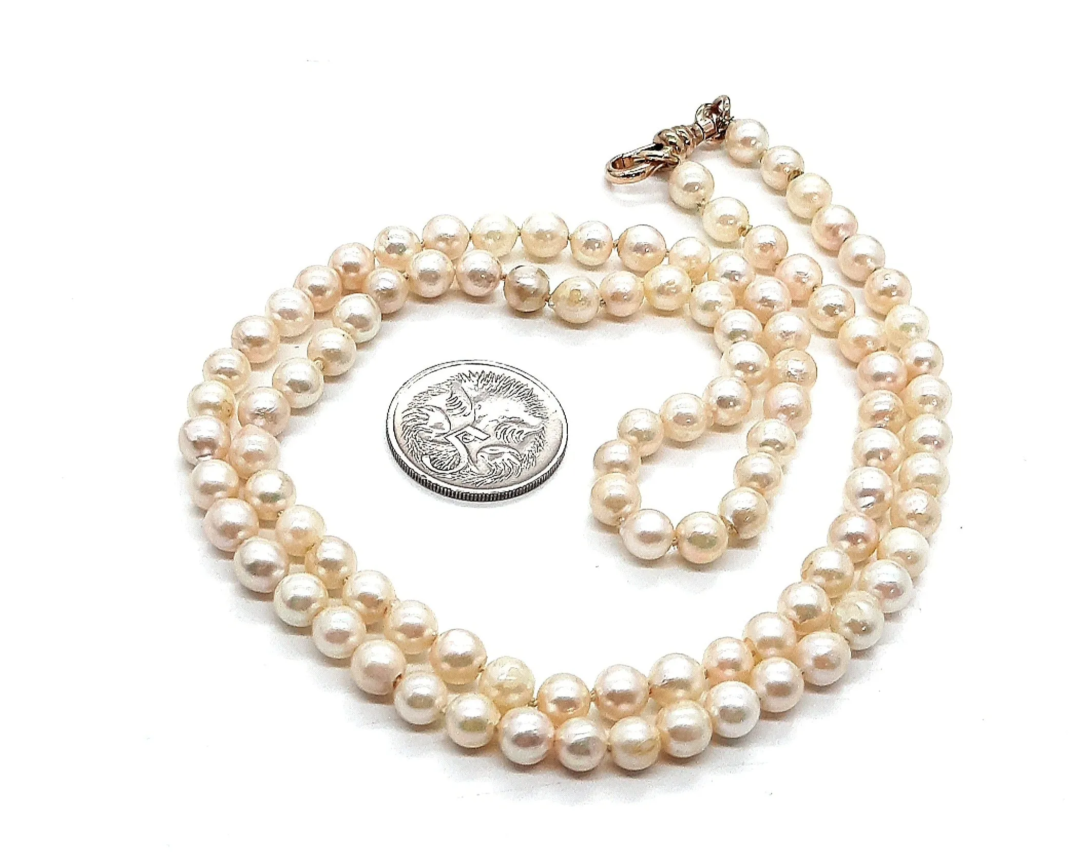 Strand of 99 Cultured Pearls with a Yellow Gold Albert Swivel Clasp