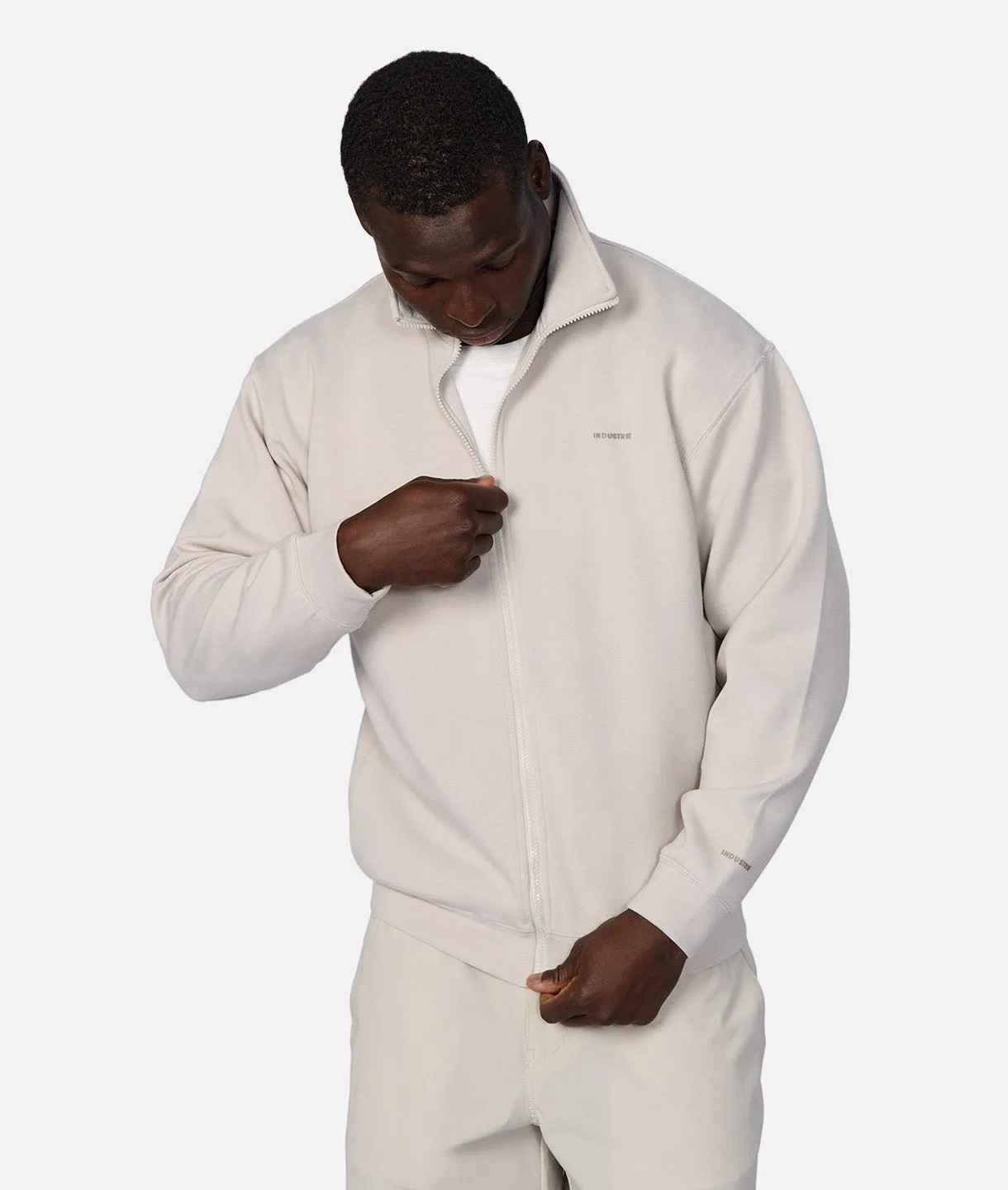 The Zip Thru Track Top - Stone