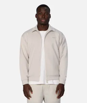 The Zip Thru Track Top - Stone