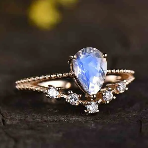 Vintage Female Moonstone engagement ring rose gold split shank milgrain