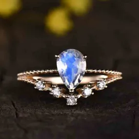 Vintage Female Moonstone engagement ring rose gold split shank milgrain